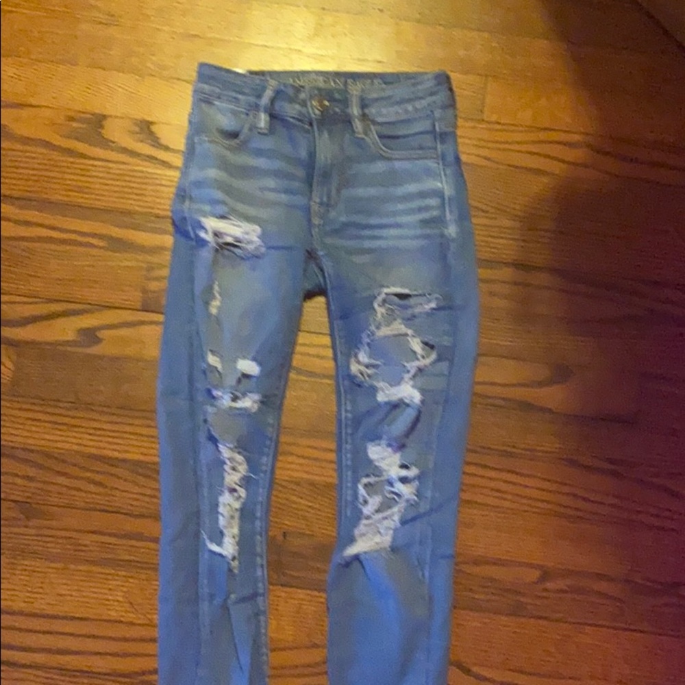 blue american eagle ripped jeans